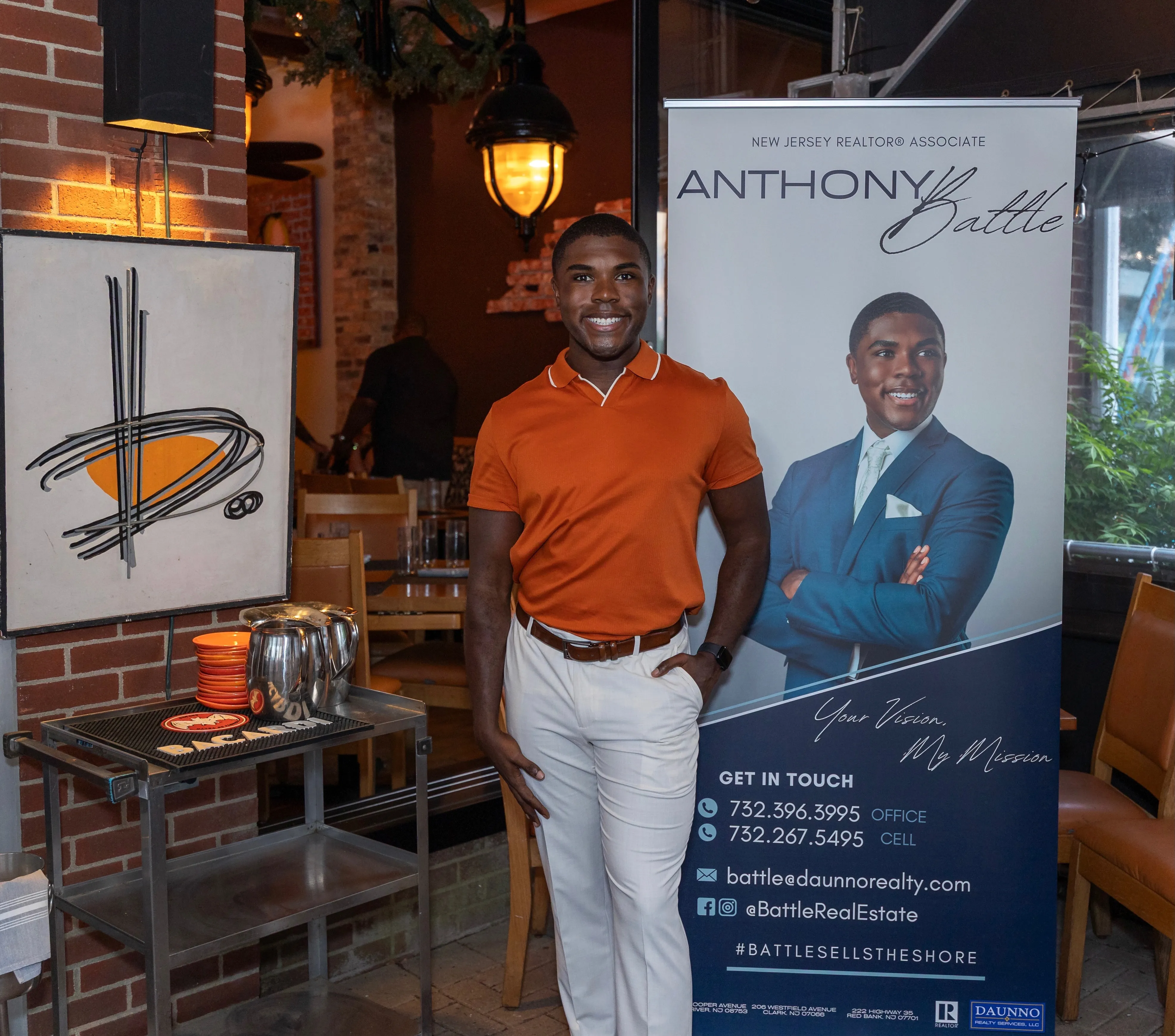 Anthony Battle posing at a Battle Connects event